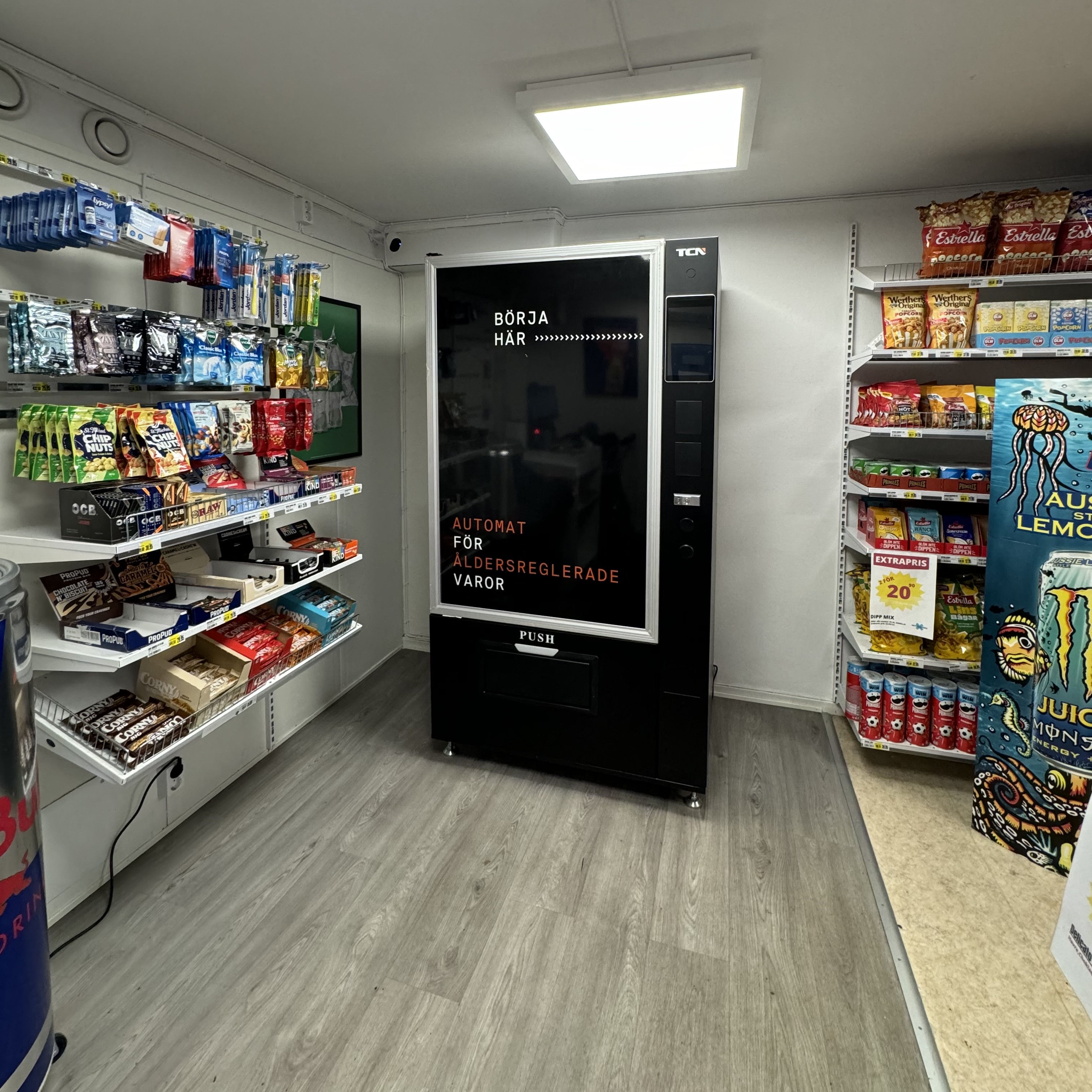 Tobaksautomat med spiral och skyddat glas